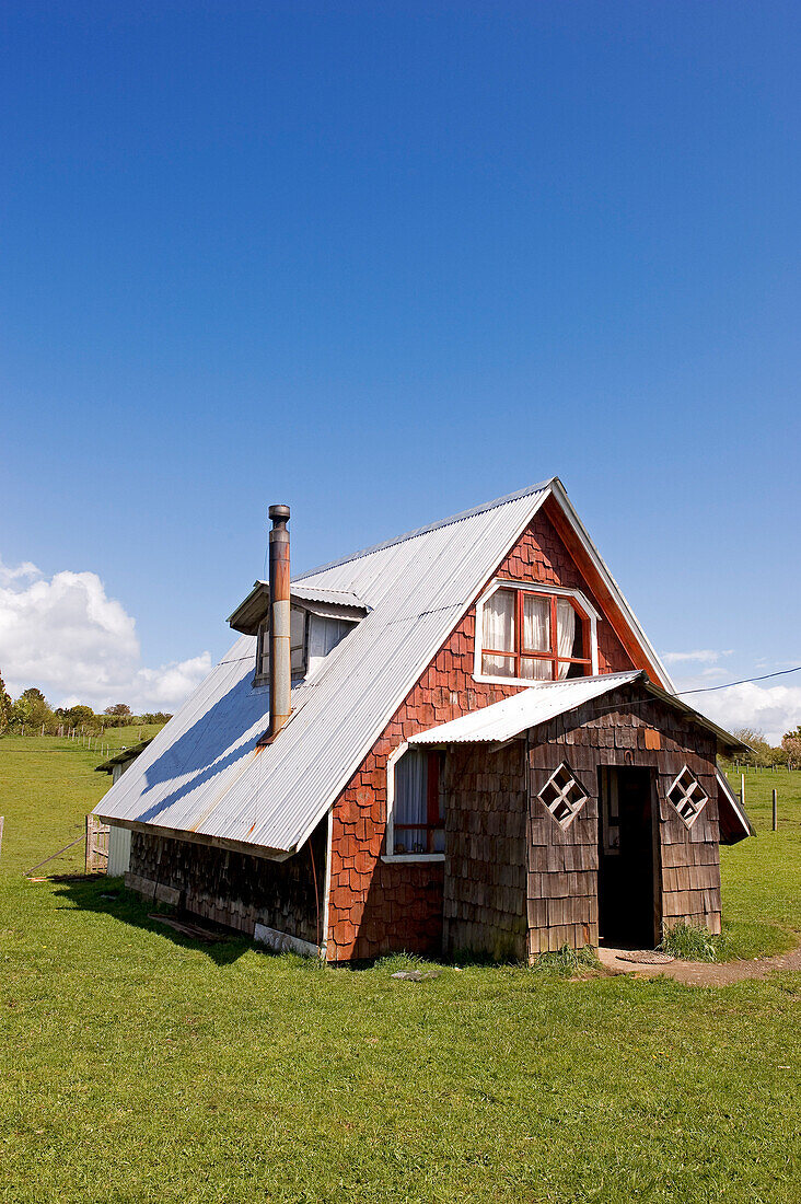 Chile, Los Lagos Region, Chiloé Island, Quinchao Island, traditional house covered with Alerce wood