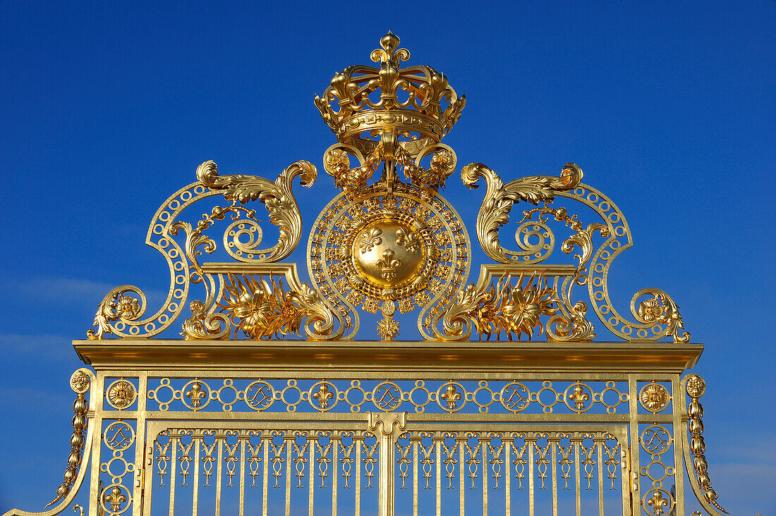 France, Yvelines, Chateau de Versailles, listed as World Heritage by UNESCO, detail of the Royal Gate drawn by Mansart (restored in June 2008) which separating the Royal Courtyard