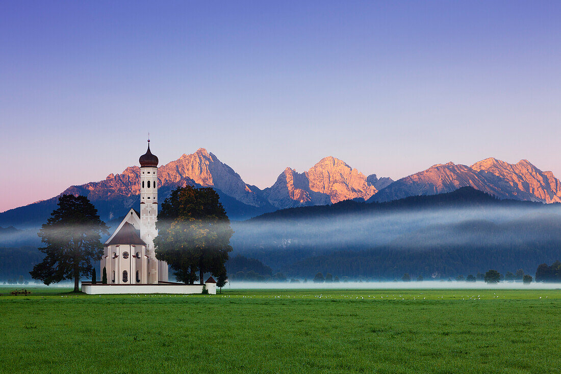 St Coloman pilgrimage church, view to Tannheimer mountain range, Allgaeu Alps, Allgaeu, Bavaria, Germany