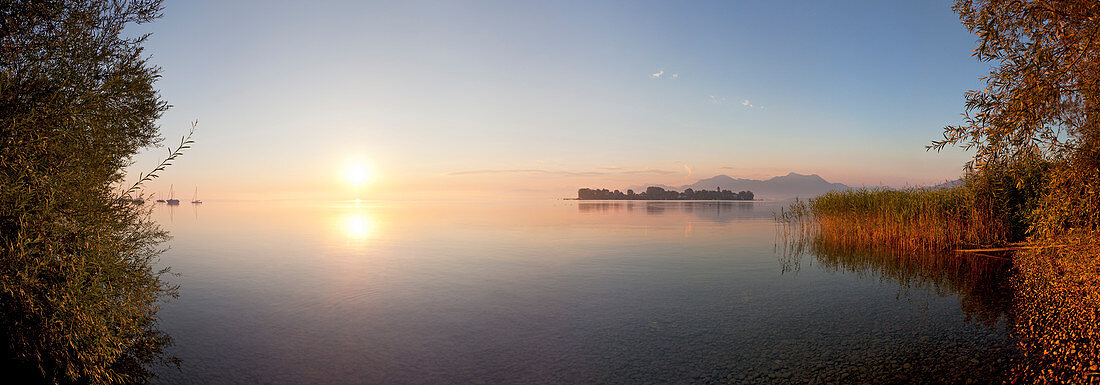 View over Chiemsee to Fraueninsel, near Gstadt, Bavaria, Germany