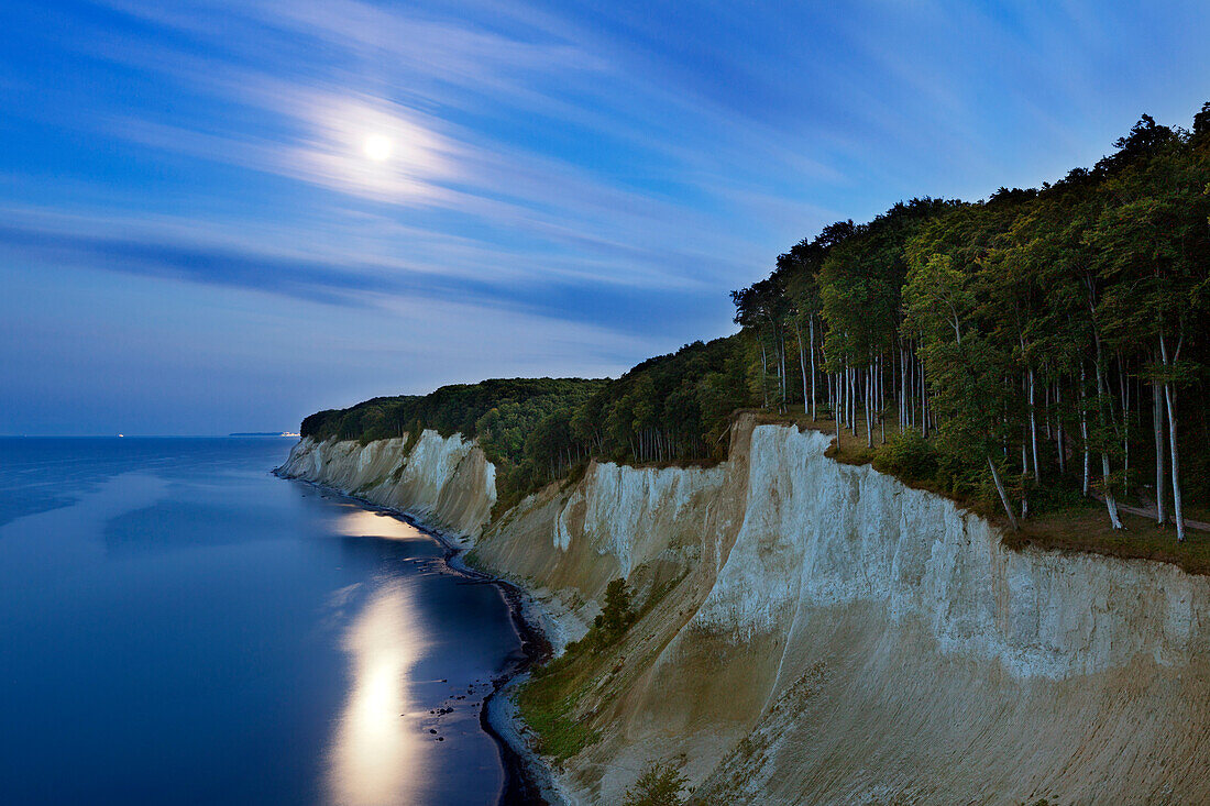Moon above the chalk cliffs, Jasmund national park, Ruegen, Baltic Sea, Mecklenburg-West Pomerania, Germany