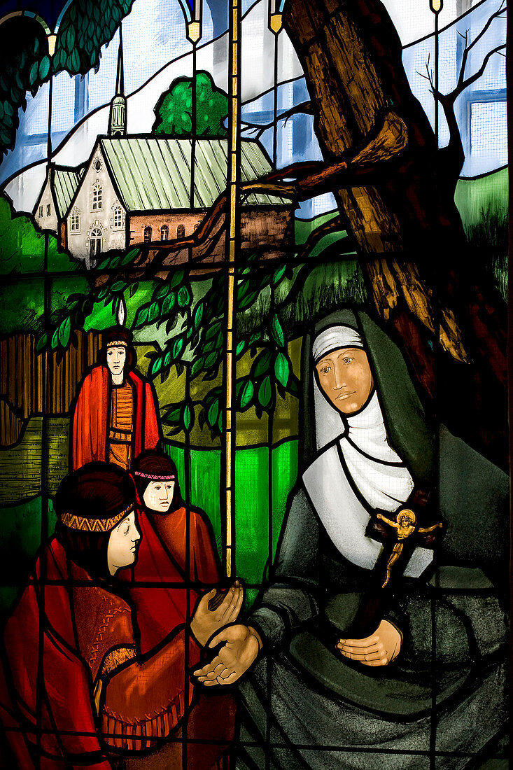 Canada, Quebec Province, Quebec City, Ursulines Chapel, stained glass window with a nun and Amerindians