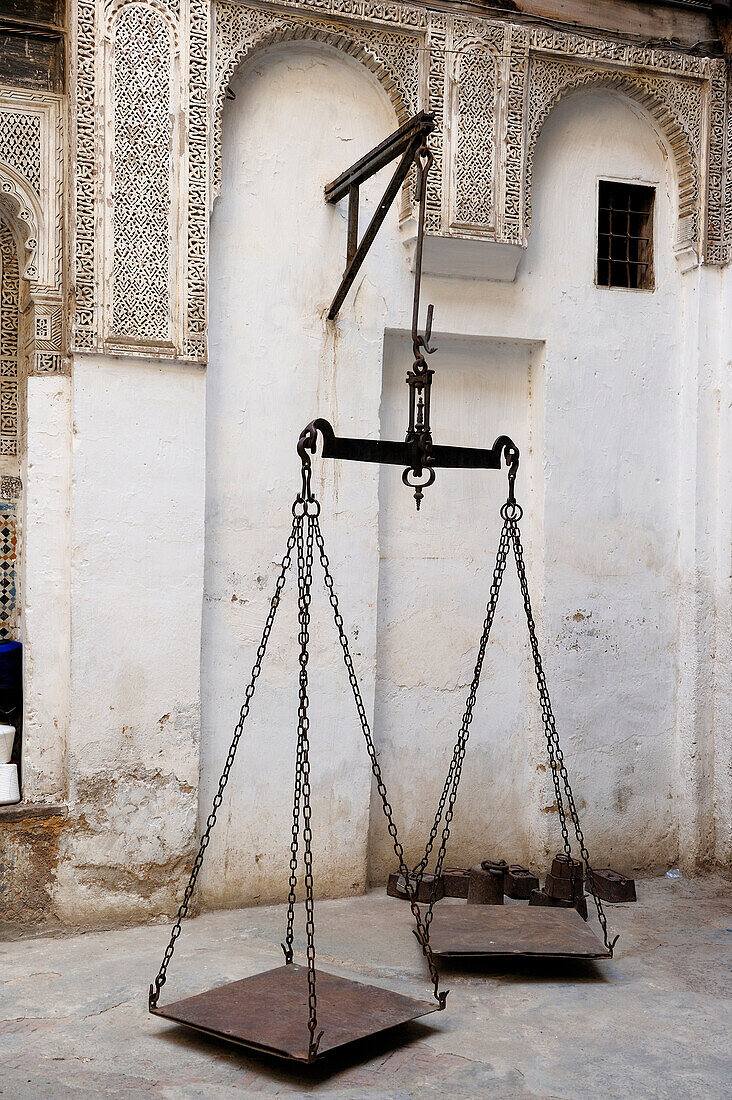 Morocco, Middle Atlas, Fez, Imperial City, Fez El Bali, medina listed as World Heritage by UNESCO, scales for weighting salt in caravanserai or funduq Sagha
