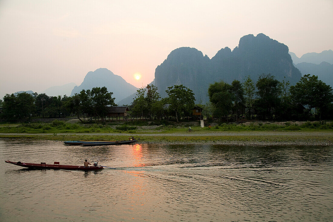 Laos, Vientiane Province, Vang Vieng, the small city has developped along Nam Song River, the dugout canoes can be hired for small trips