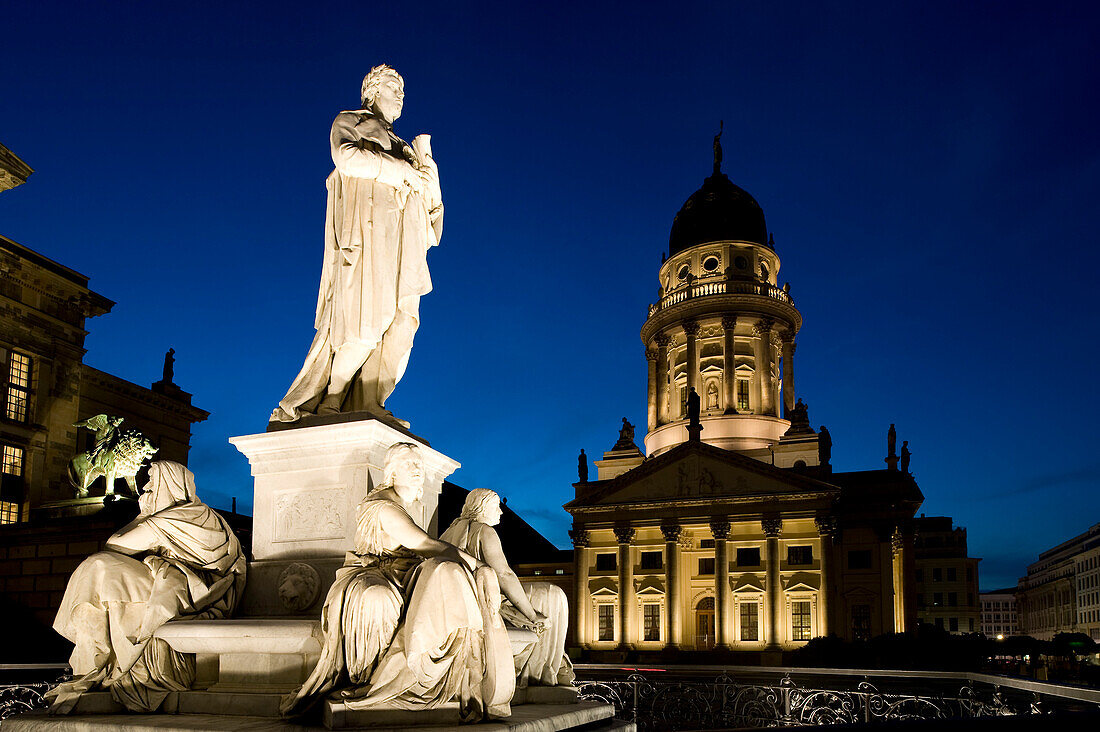 Germany, Berlin, Gendarmenmarkt, French church built between 1701 and 1705 by architects Louis Gayard and Abraham Quesnay and the marble statue of Schiller