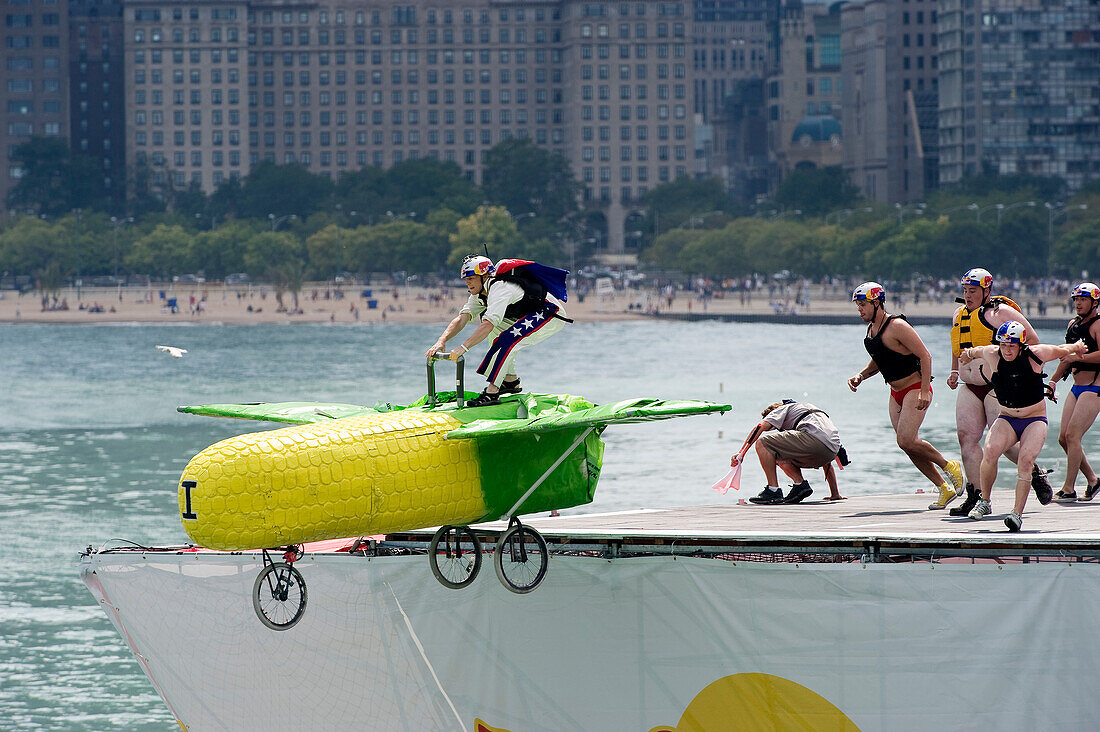 'United States, Illinois, Chicago, The Red Bull Flugtag is an annual fun event sponsored by Red Bull that takes place on the Lake Michigan. All sorts of so called flying objects have got to fly as far as they can; here the corn of Go Shuck Yourself from A
