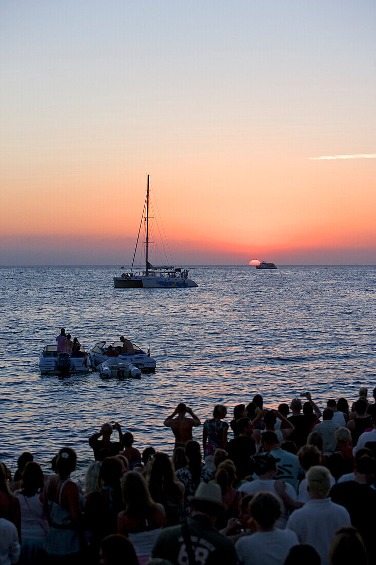 Spain, Balearic Islands, Ibiza island, Sant Antoni, sunset in front of the Cafe del Mar