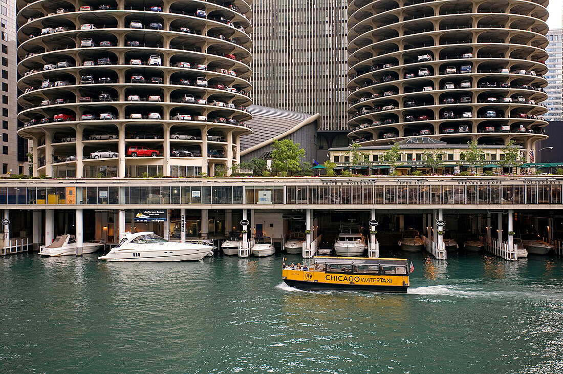 United States, Illinois, Chicago, Loop District, Marina City, Corn on the Cob Building, taxi boat on Chicago River