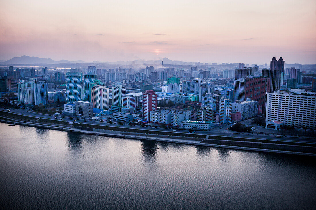 A view at dusk over the Taedong river in Pyongyang, North Korea.