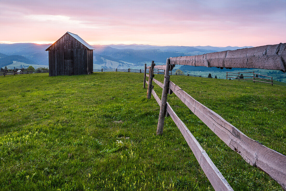 Rural Romanian landscape at sunrise in the Bukovina Region (Bucovina), Paltinu, Romania, Europe