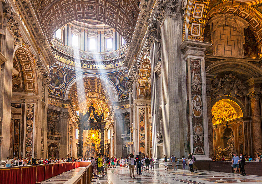 Interior of St. Peters Basilica with light shafts coming through the dome roof, Vatican City, UNESCO World Heritage Site, Rome, Lazio, Italy, Europe