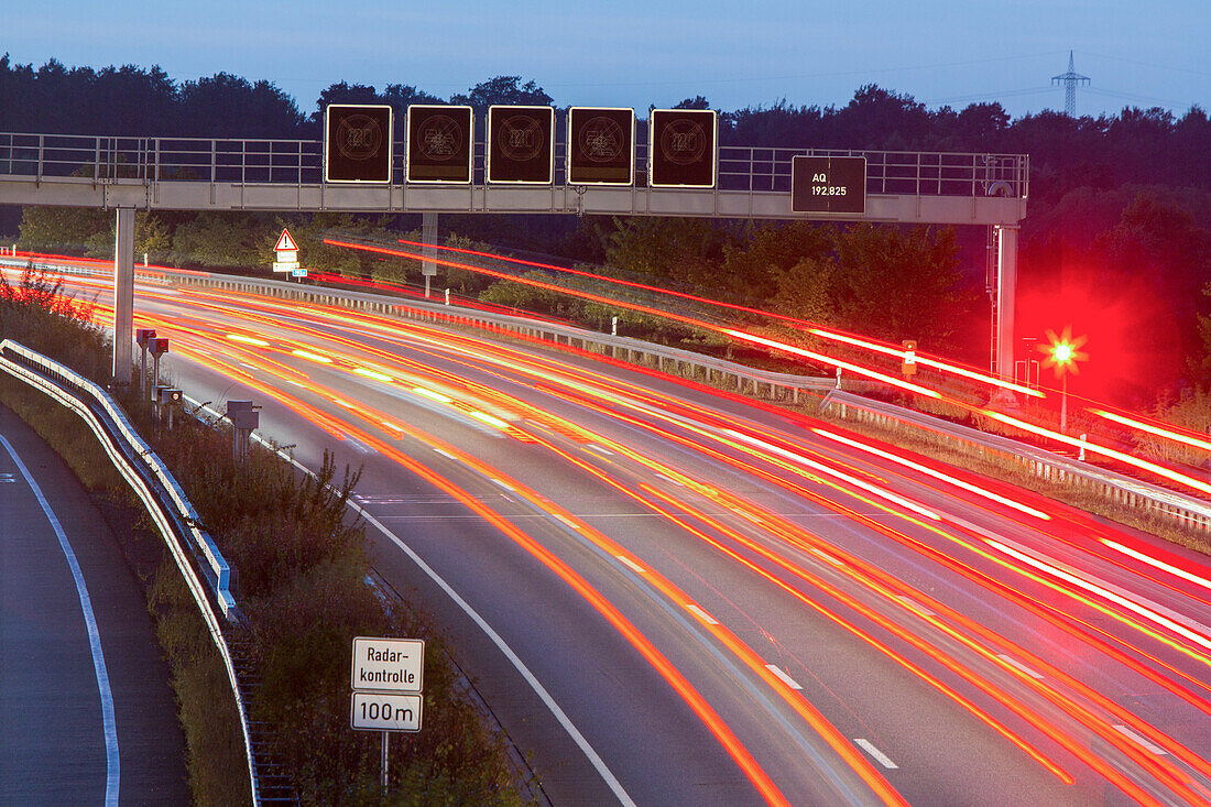night lights, light trails, streaks, motion, German Autobahn, radar, motorway, highway, freeway, speed, speed limit, traffic, infrastructure, near Peine, Germany