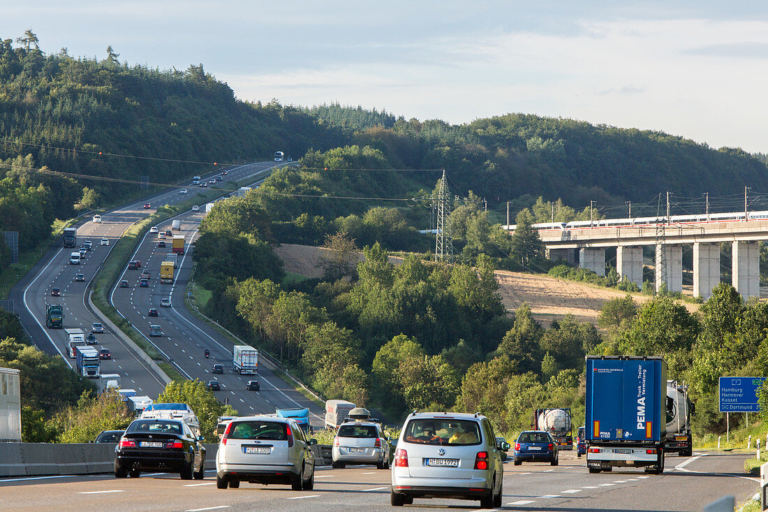 German Autobahn, A 7, high speed train lines, pillars, supports, forest, green, railway, motorway, highway, freeway, speed, speed limit, traffic, infrastructure, intersection, Kirchheim, Germany