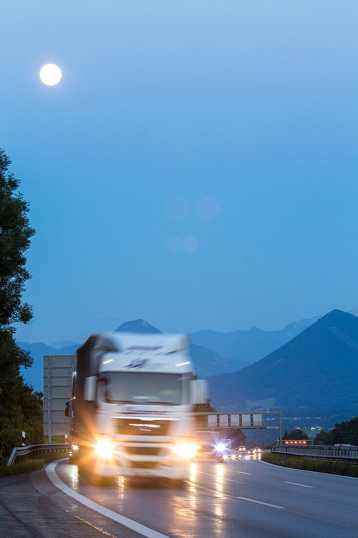 German Autobahn, A 8, Alps, moon, oncoming truck, landscape, hills, trucks, motorway, highway, freeway, speed, speed limit, traffic, infrastructure, hills, evening,  Bavaria, Germany