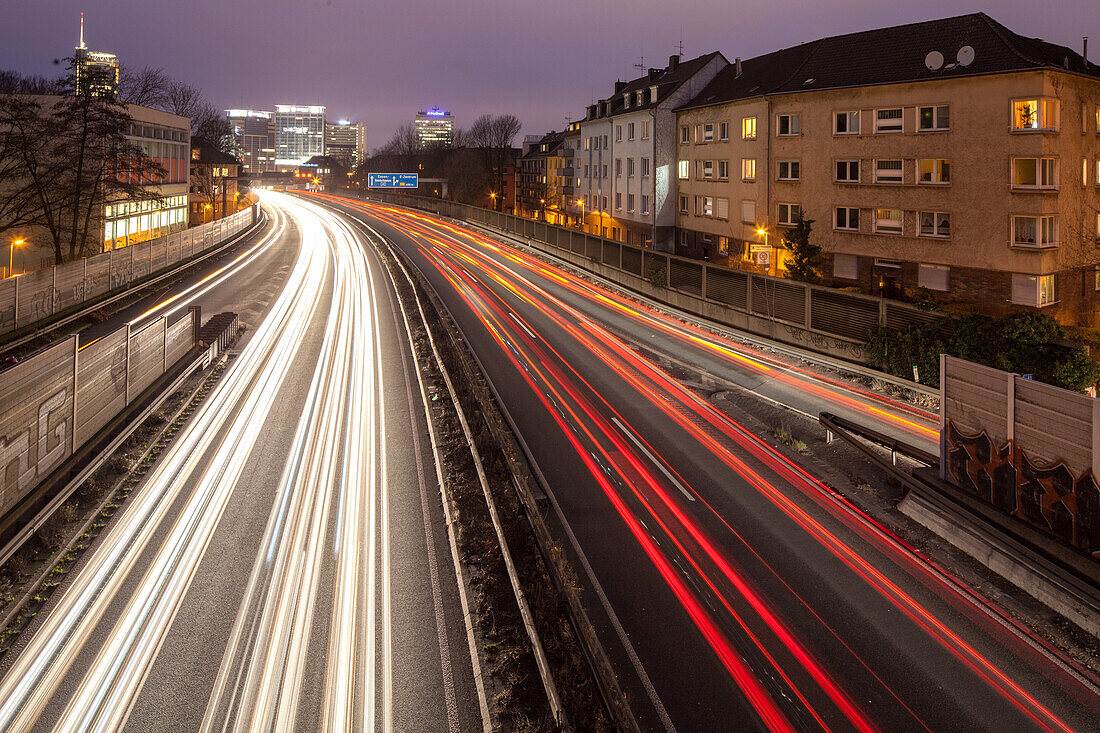 German Autobahn A 40, noise barrier, wall, tail lights light trails, night, motorway, highway, freeway, speed, speed limit, traffic, infrastructure, Essen, Germany