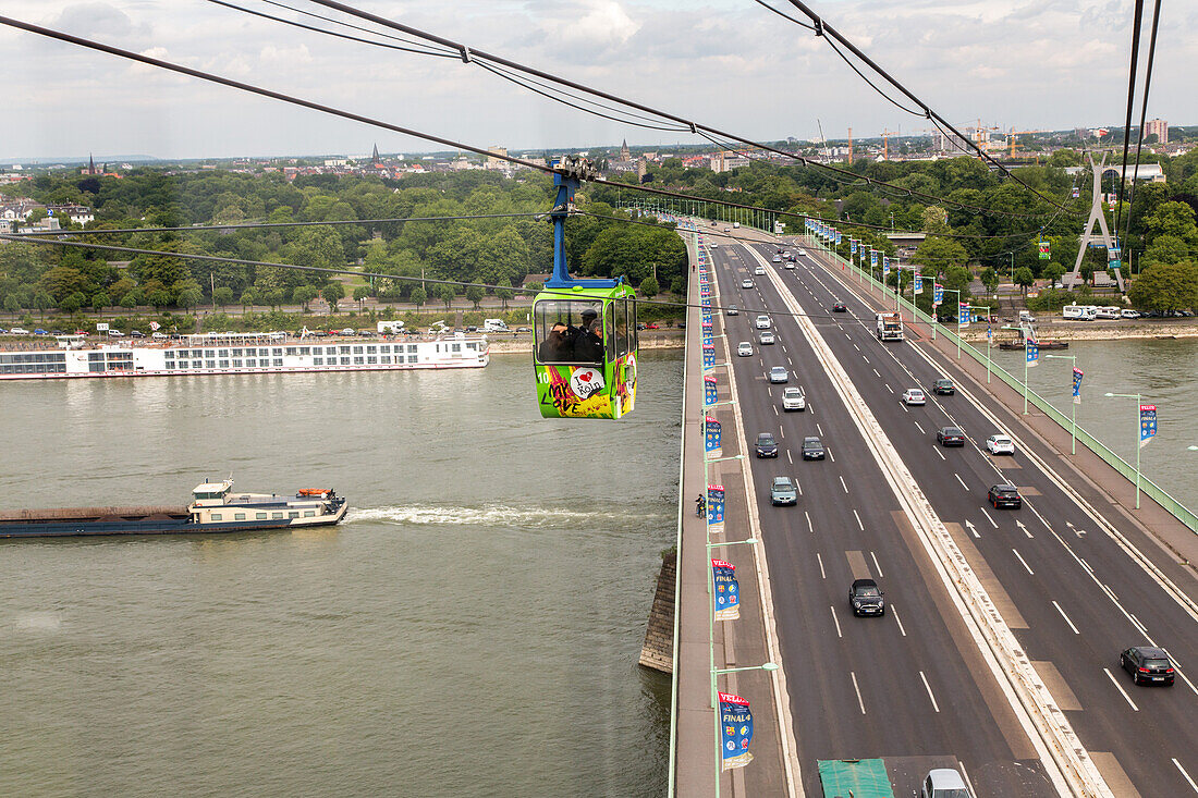 German Autobahn approach road, cable cars cross Rhine bridge, Zoo bridge, motorway, freeway, speed, speed limit, traffic, infrastructure, Cologne, Germany