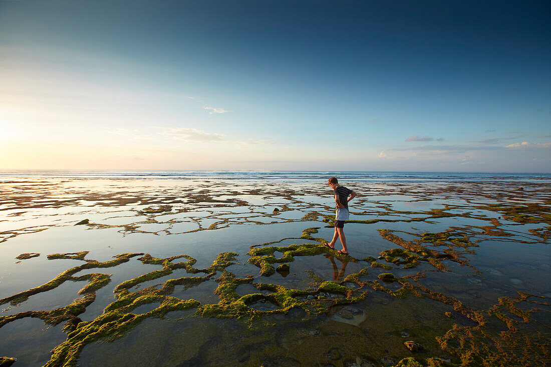 Stand at low tide, Balangan, Bali, Indonesia
