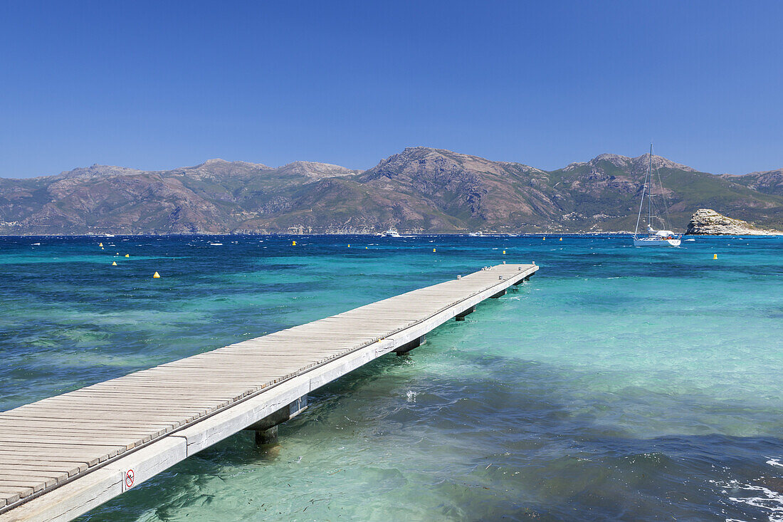 Jetty of ferry on beach Plage de Loto in the Desert of Agriates, near Saint-Florent, Corsica, Southern France, France, Southern Europe