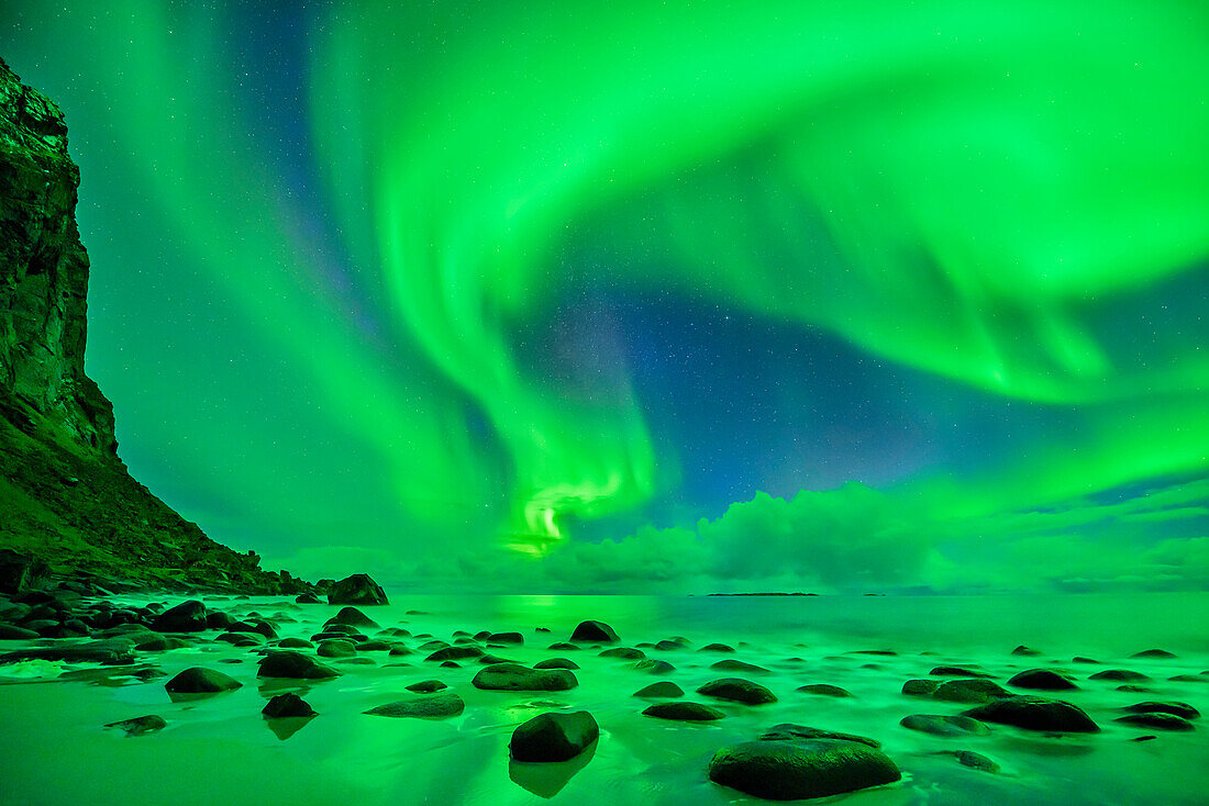 Aurora borealis, Aurora above beach and Northern Atlantic Ocean, Lofoten, Norland, Norway