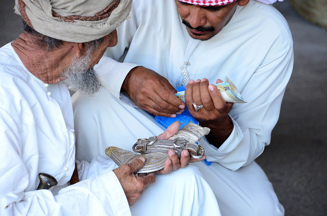 Daggers on the market in Ibra, Oman