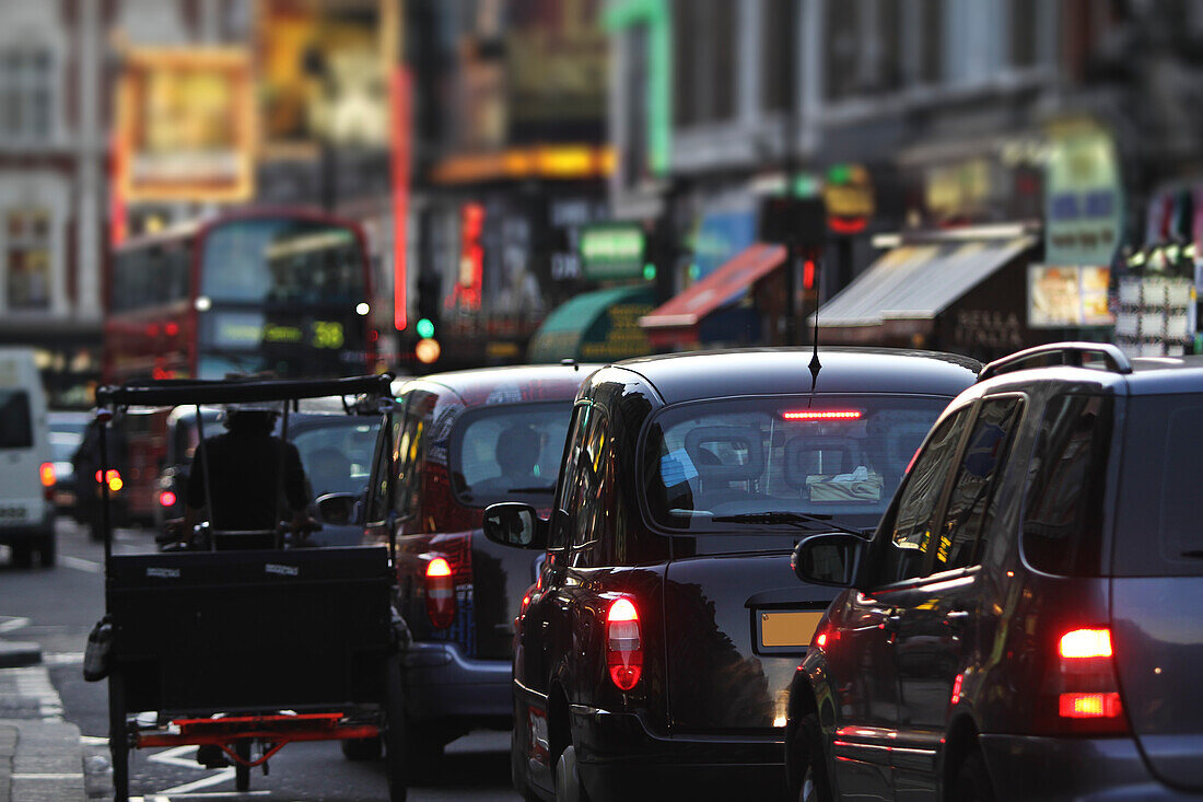 Taxis and traffic on Shaftsbury Avenue, London, England