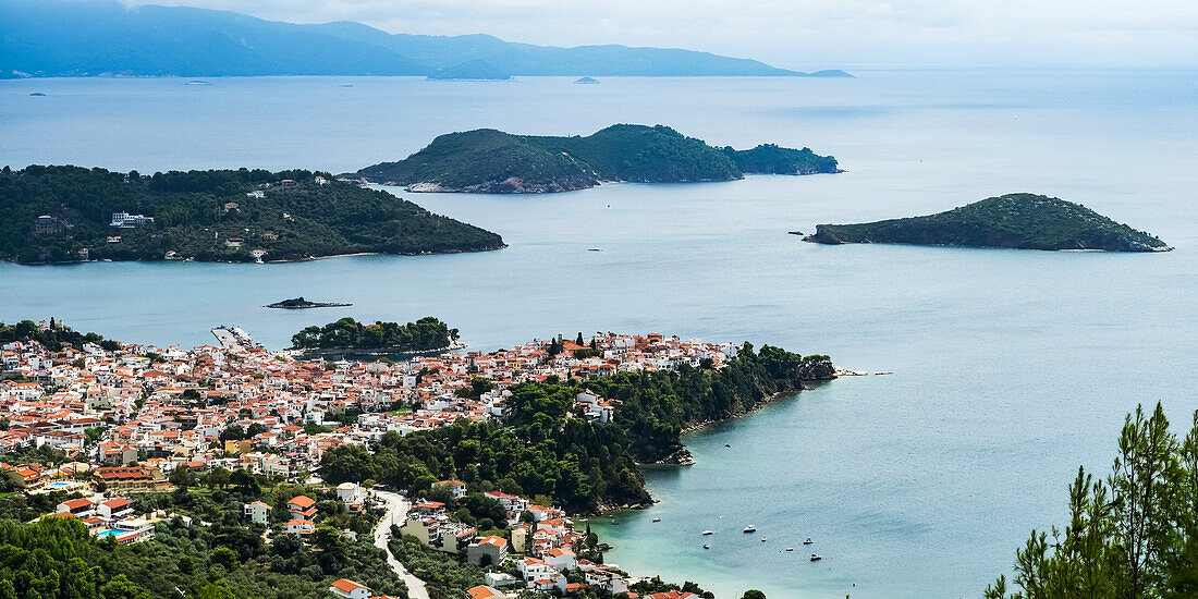View of the Aegean Sea and a village on the coast of a greek island, Skiathos, Greece