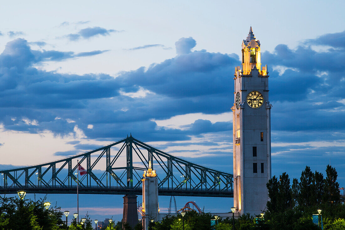 Tower clock at the old port and Jacques Cartier Bridge, Montreal, Quebec, Canada
