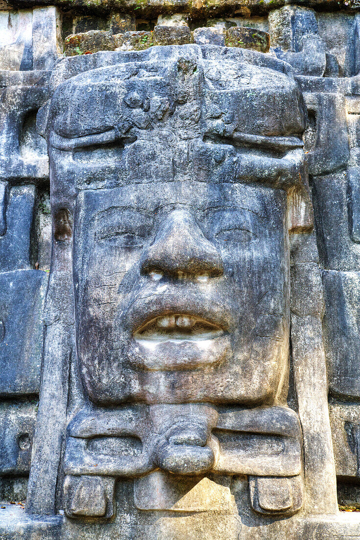 Stucco mask, The Mask Temple, Lamanai Mayan site, Belize