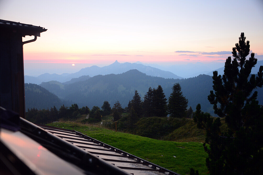 Sunrise at the Hochries hut over Samerberg, Chiemgau county, Bavaria, Germany
