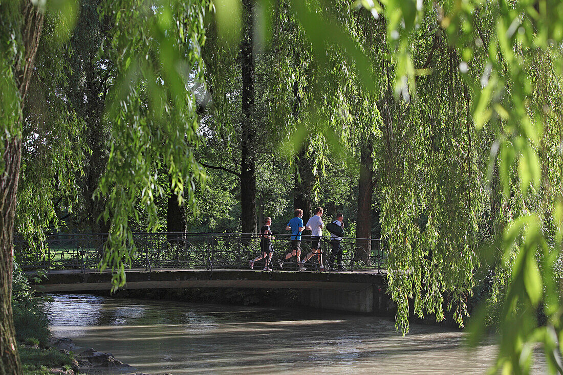 Jogger, Bridge over the Schwabinger stream, English Garden, Englischer Garten, Munich, Bavaria, Germany