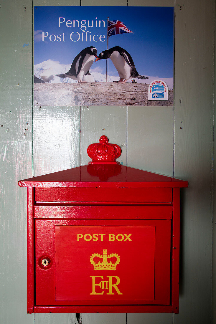 'Red post box at the ''Penguin Post Office'' at the museum of Port Lockroy British Antarctic Survey Station Port Lockroy, Wiencke Island, Graham Land, Antarctic Peninsula, Antarctica'