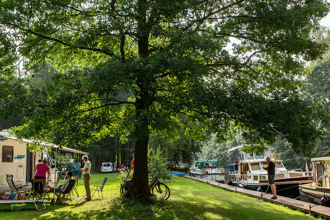 camping in forest on the banks of the river Elde, Mecklenburg-Vorpommern, Germany