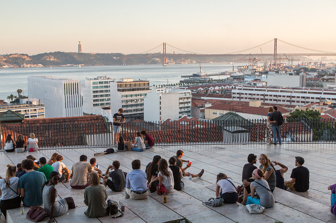 Miradouro de Santa Catarina with view over the port and 25th April Bridge, Lisbon, Portugal
