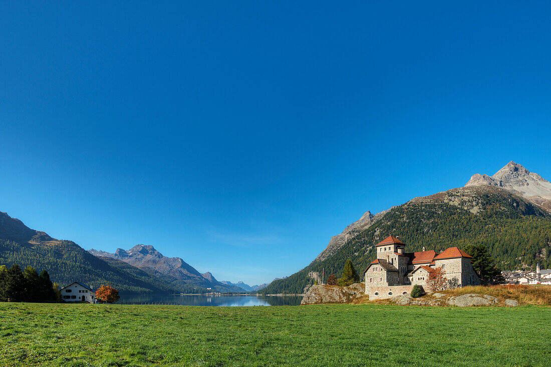 Crap da ass castle with Lake Silvaplana, Piz da la Margna and Piz Polaschin, Silvaplana, Engadine, Canton Grisons, Switzerland