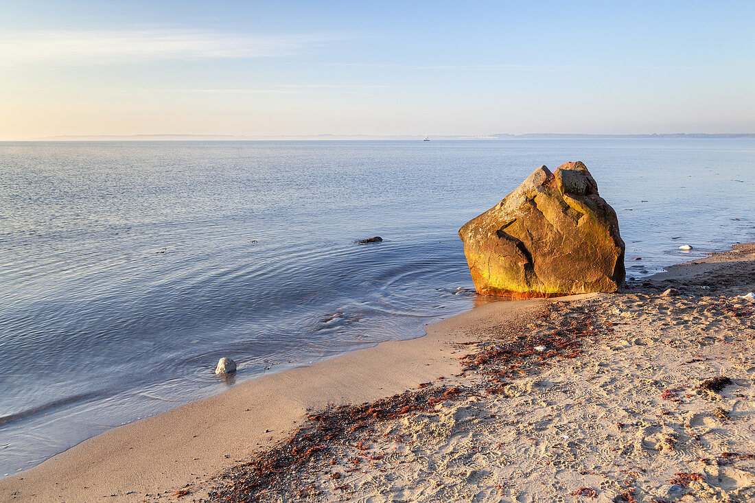 Boulder at the Baltic beach near Waabs, Baltic coast, Schleswig-Holstein, Northern Germany, Germany, Europe