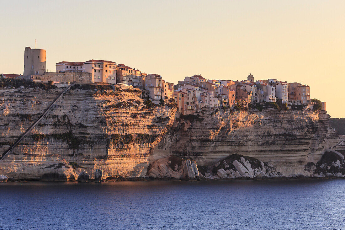 Old citadel at dawn, in early morning light, seen from the sea, Bonifacio, Corsica, France, Mediterranean, Europe