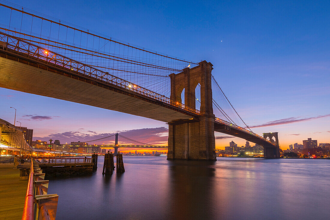 Brooklyn Bridge and Manhattan Bridge beyond, over East River, New York, United States of America, North America