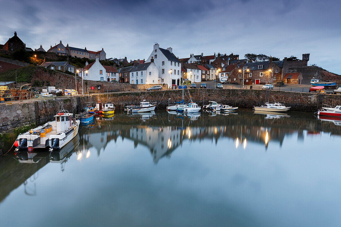 Fishing boats in the harbour at Crail at dusk, East Neuk, Fife, Scotland, United Kingdom, Europe