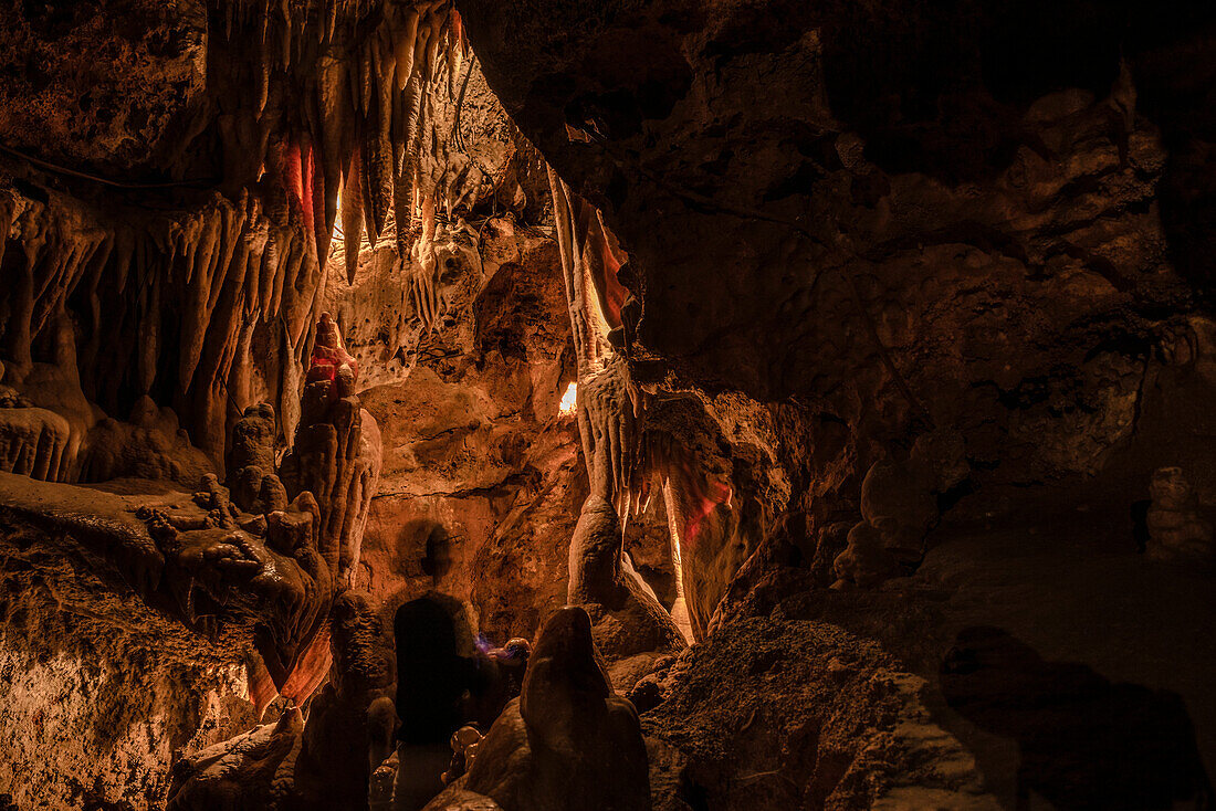 Stalactites and Stalagmites lit up in a cave, Grotte de Saint-Cezaire, Provence-Alpes-Cote d'Azur, France