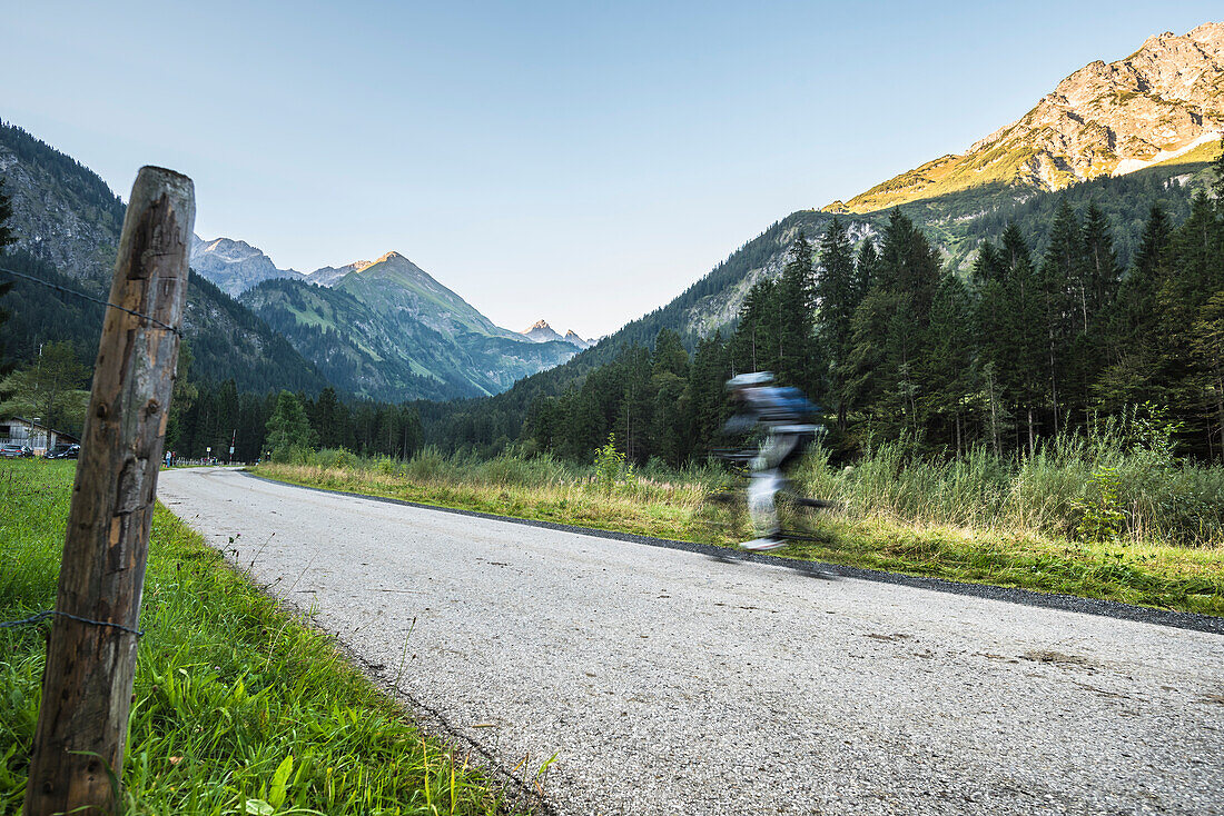 Mountainbiker on a trail through the mountains, Sportsmen, Stillachtal, Birgsau, Oberallgaeu, Oberstdorf, Alps, Germany