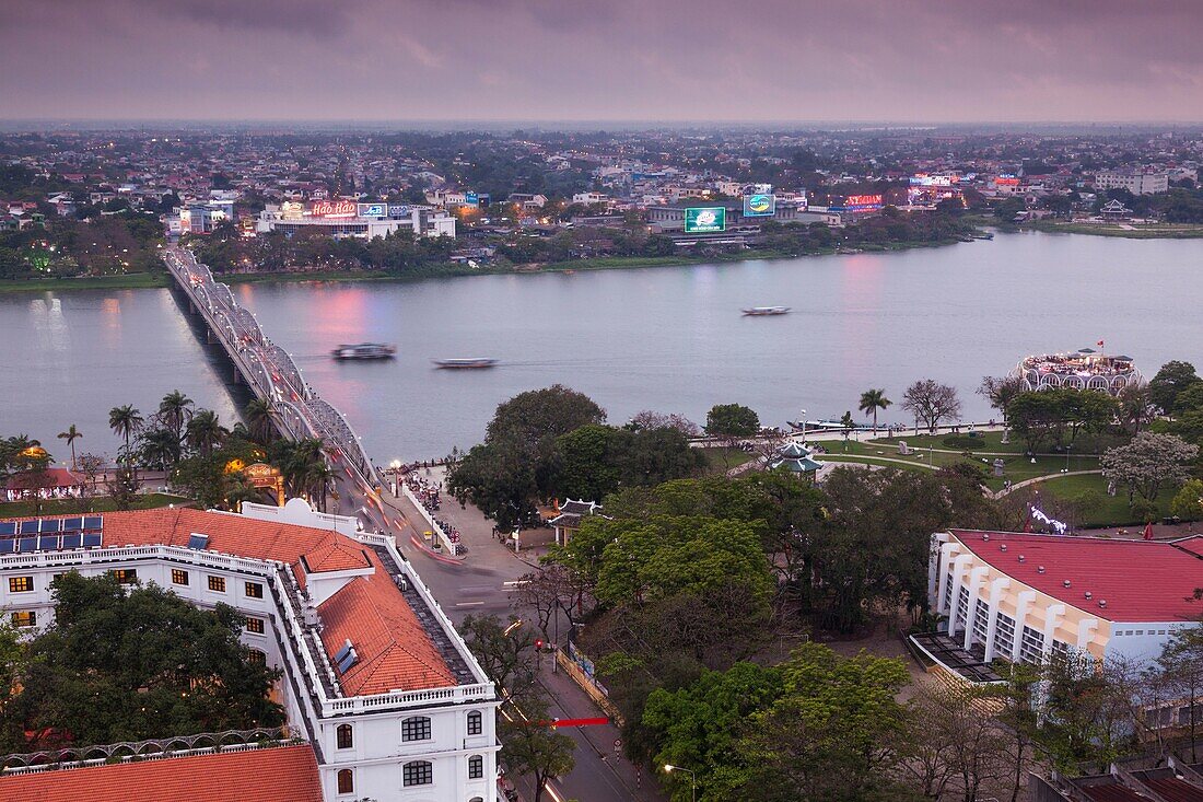 Vietnam, Hue, Trang Tien Bridge and Perfume River, elevated view, dusk.
