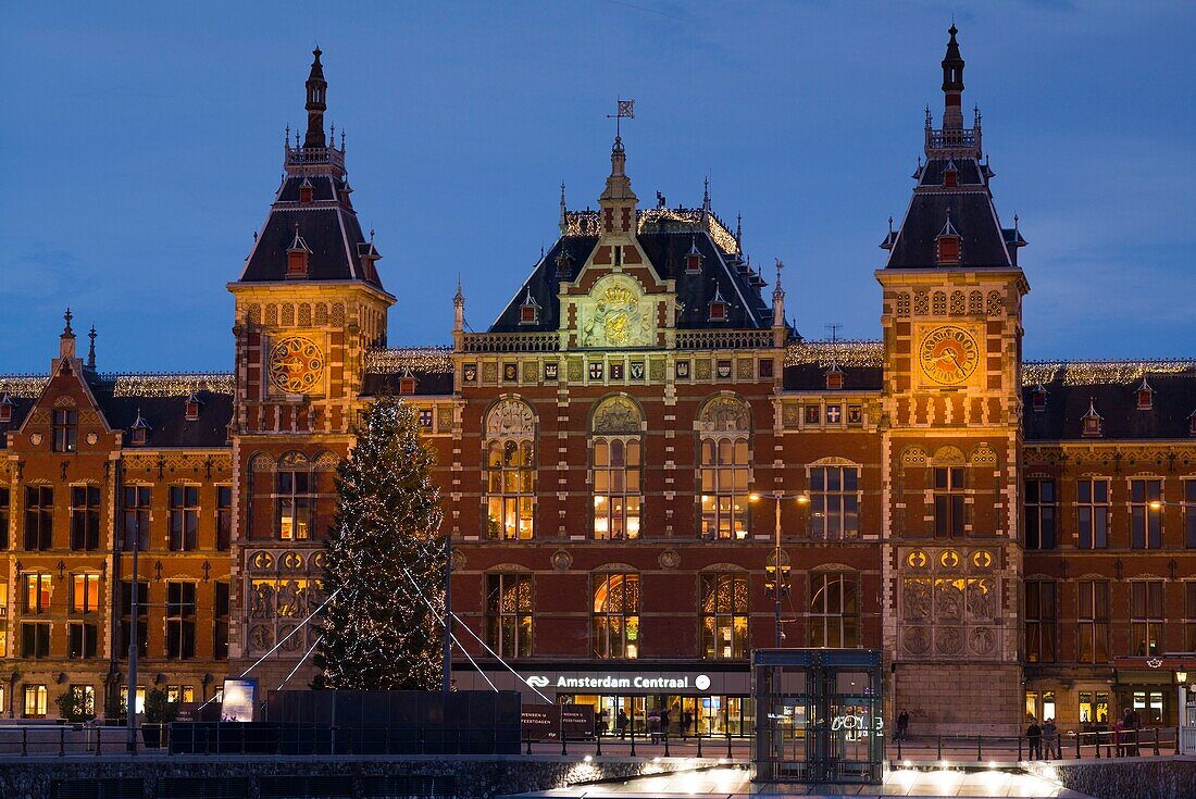 Netherlands, Amsterdam, Amsterdam Central Train Station, exterior, dawn.