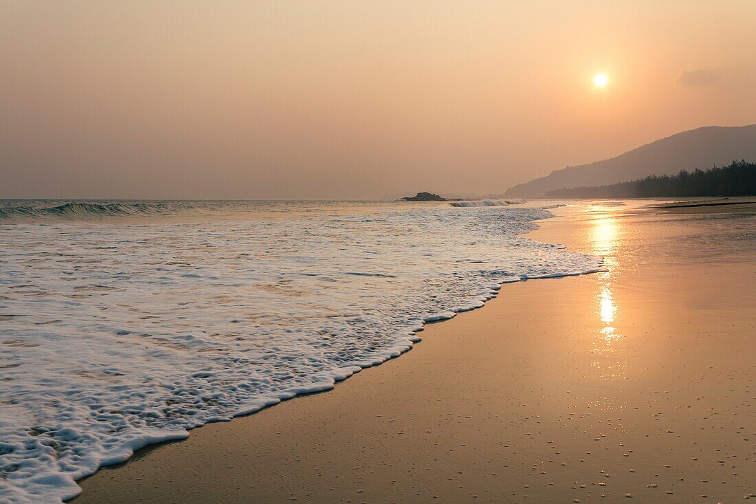 Hainan, China - The beautiful sunset view at beautiful beach.