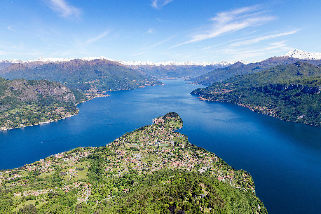 Aerial view of the village of Bellagio frames by the blue water of Lake Como on a sunny spring day Lombardy Italy Europe.