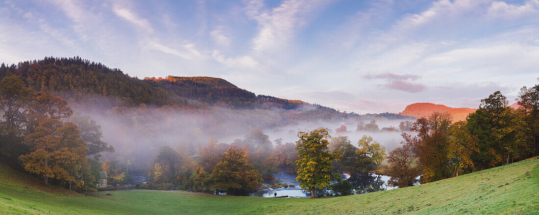 Panorama overlooking Horseshoe Falls with mist lying above the River Dee on an autumn morning, Denbighshire, Wales, United Kingdom, Europe