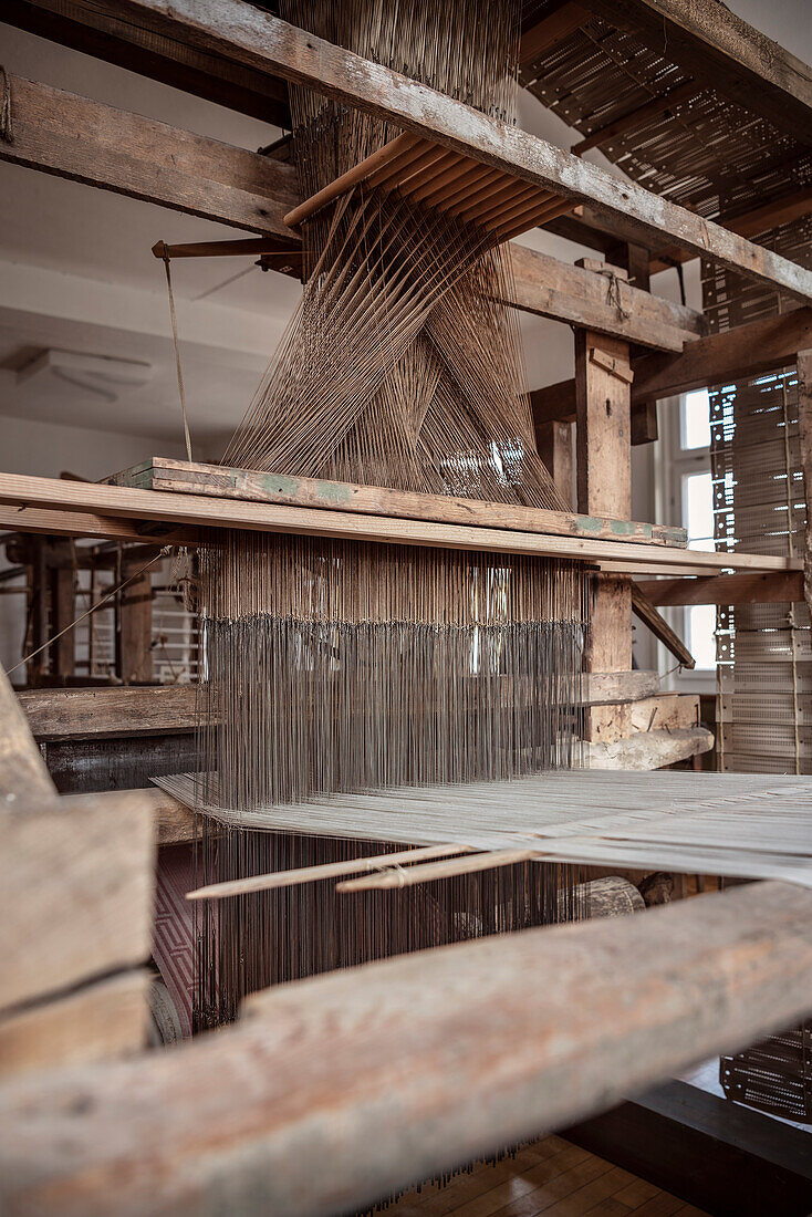 historical industrial weaving loom, textile museum at Laichingen, Swabian Alb, Baden-Wuerttemberg, Germany