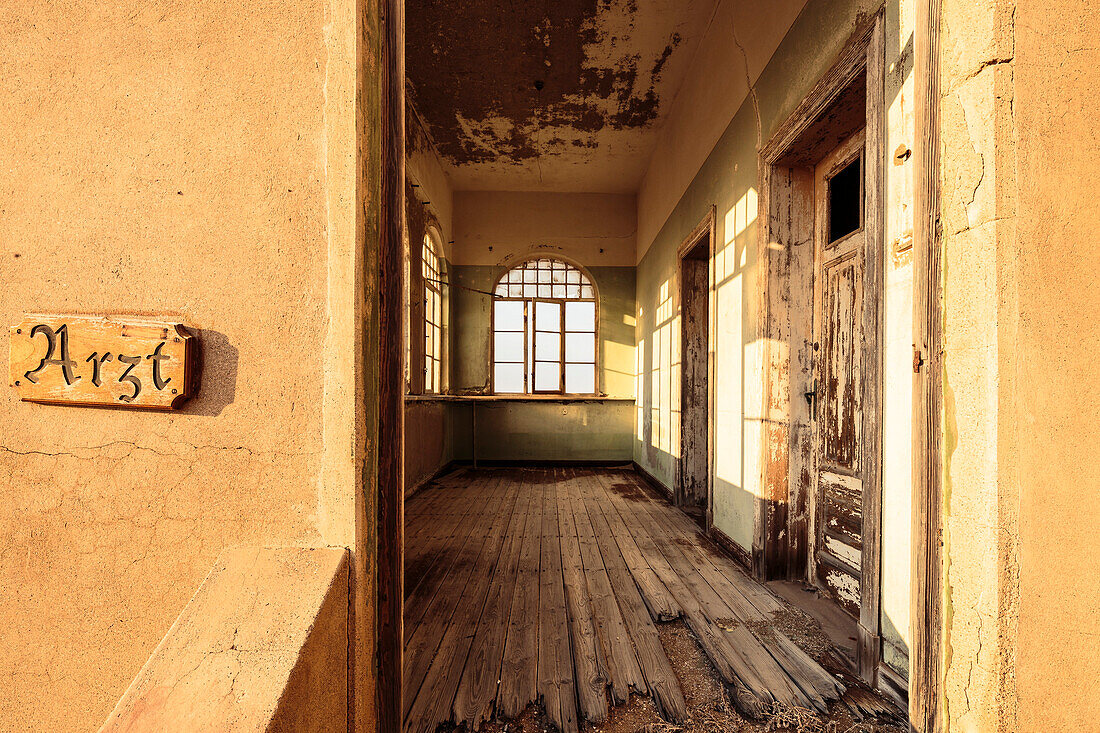 The morning sun in the doctor's house of the ghost town in Kolmanskop, former mining town, Karas, Namibia.