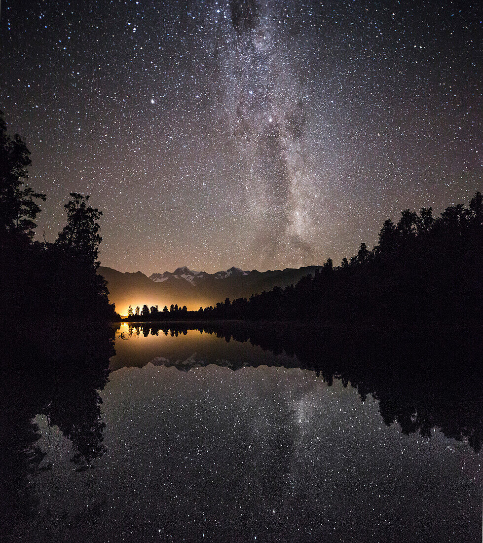 Reflections of stars in the water at Lake Matheson, Mount Cook, Mount Cook, Westland Tai Poutini National Park, West Coast, South Island, New Zealand, Oceania