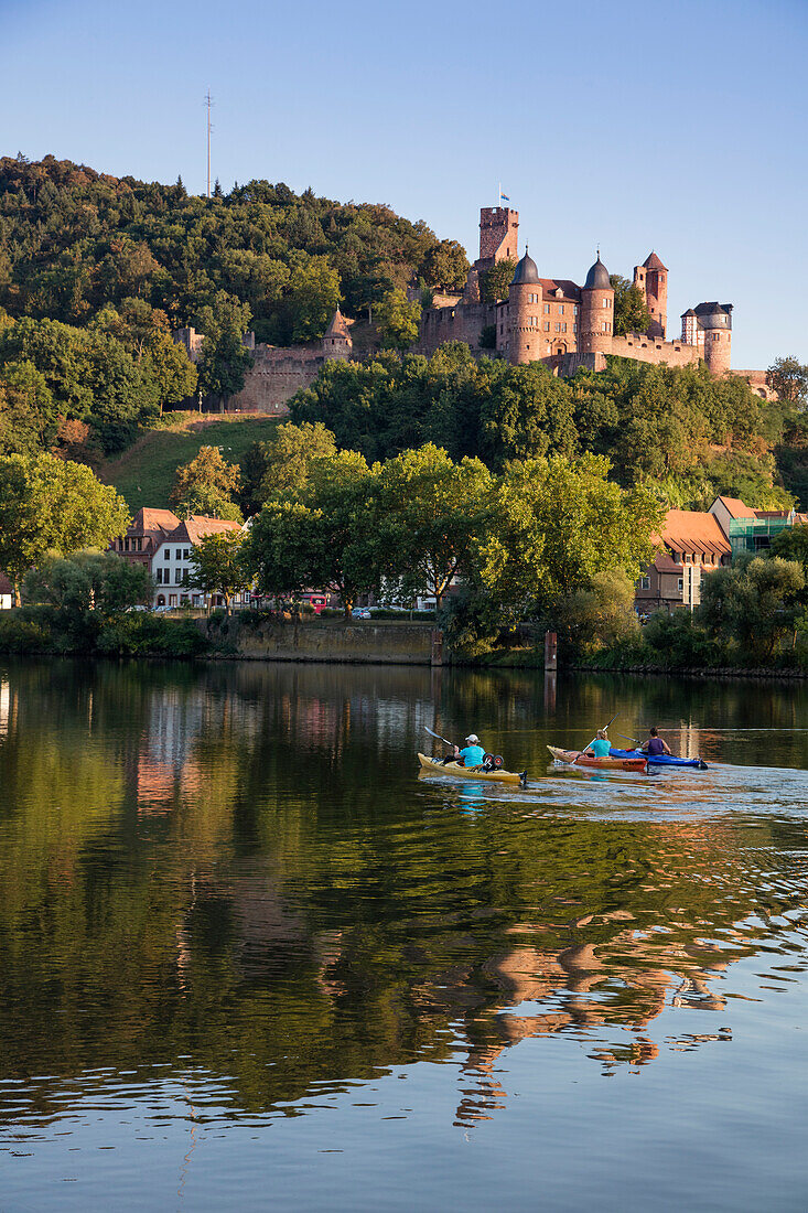 People kayaking on Main river with Burg Wertheim castle, Kreuzwertheim, near Wertheim, Spessart-Mainland, Franconia, Baden-Wuerttemberg, Germany