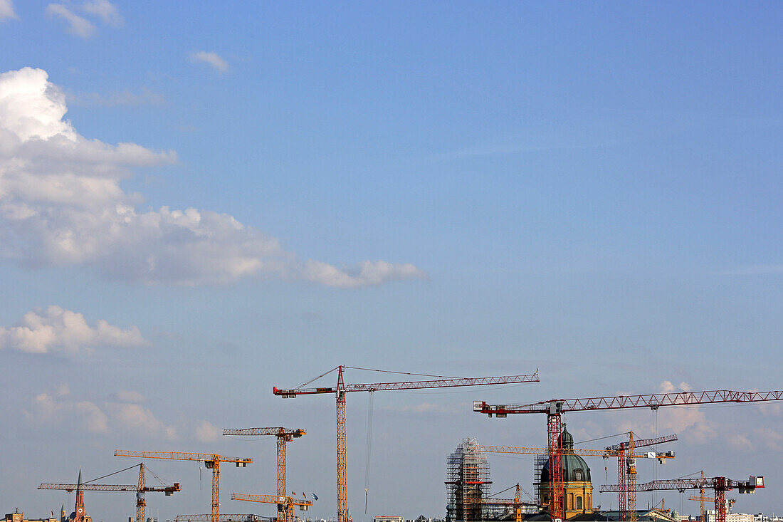 Construction cranes and Theatinerkirche church, Old town, Munich, Upper Bavaria, Bavaria, Germany